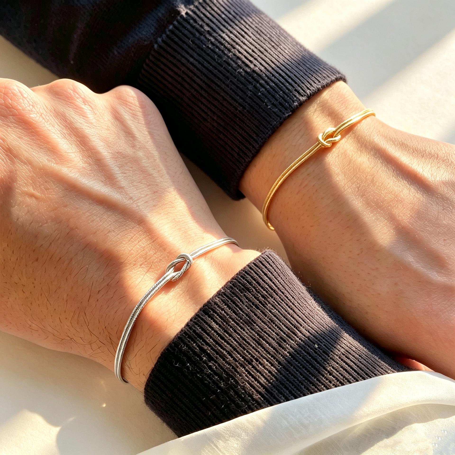 Cross-border Amazon stainless steel bracelet with gold and silver knotted and intertwined circles, simple design, couple's style, elegant bracelet