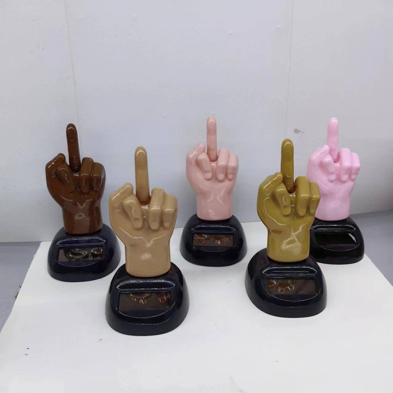Factory supply creative new solar Apple flower car interior decoration new strange doll finger swing