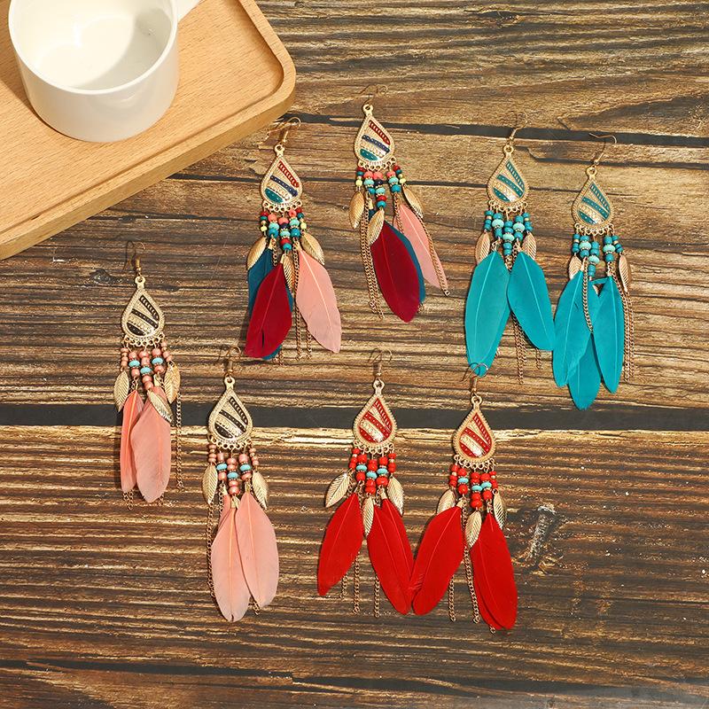 High-value tremolo feather earrings Bohemian long tassel photo trendy women's ear hook personality wholesale earrings